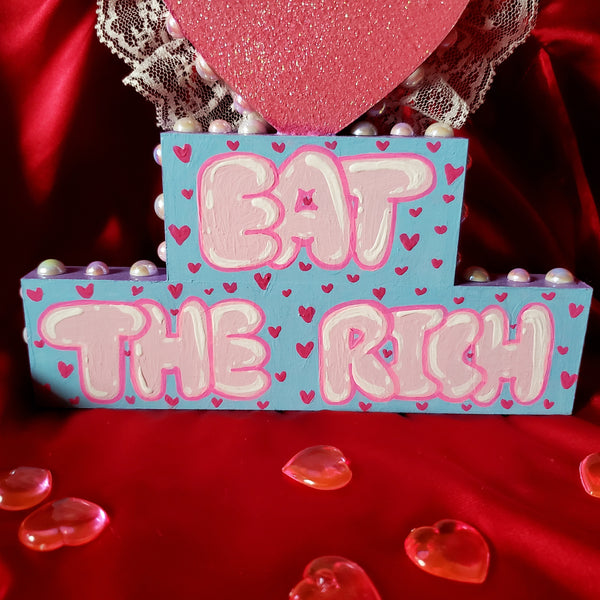 'EAT THE RICH' HOME DECOR PLAQUE